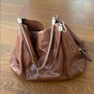 Dalton 31 Coach bag in brown leather.
